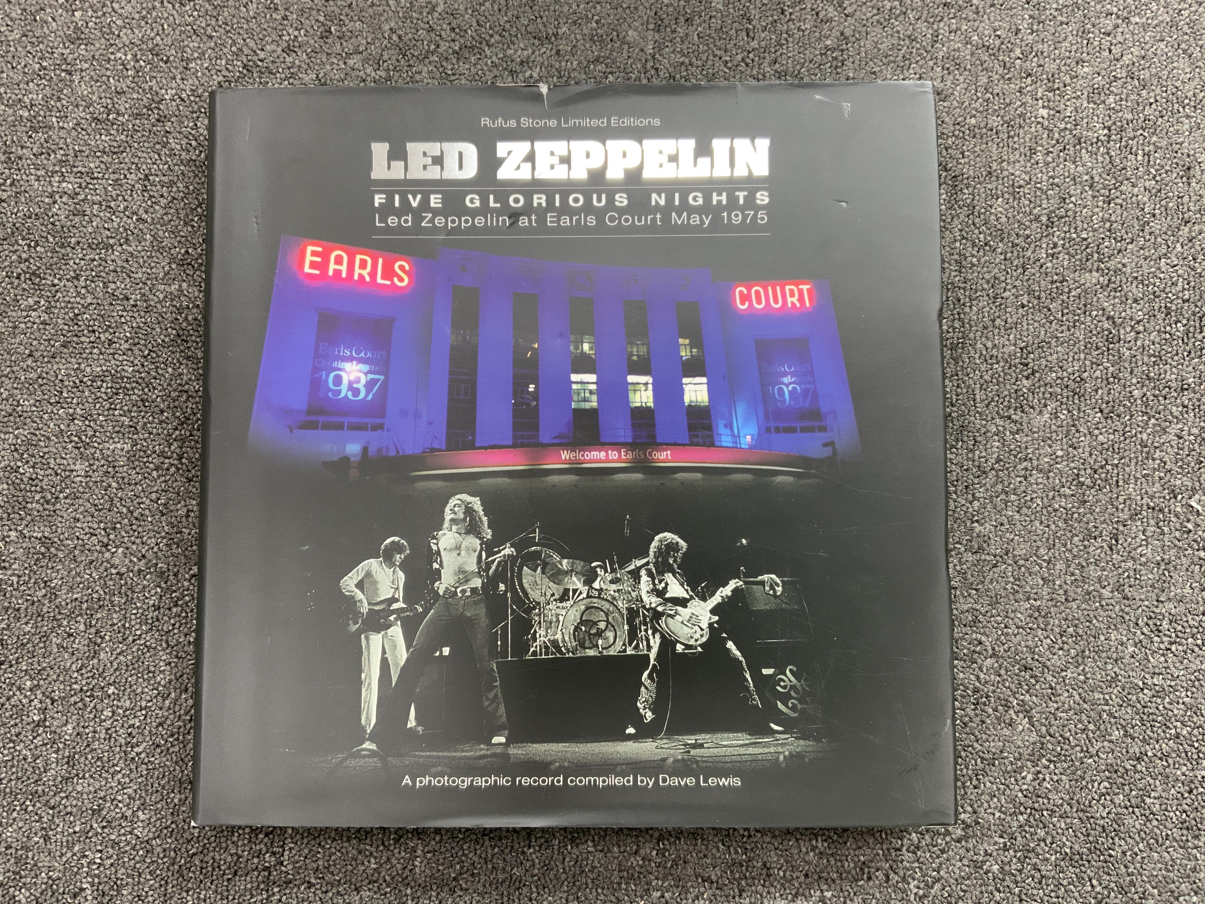 A signed copy of Led Zeppelin - Five Glorious Nights, by Dave Lewis, pub. Rufus Stone Limited Editions Ltd., limited edition 735/1000. Condition - fair